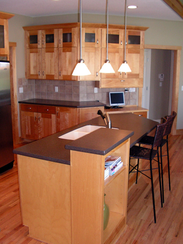 Unique Shaped Custom Island Cabinet with Bumped Up Bookcase and other features