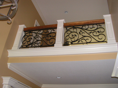 Custom Iron Work Inset Panel with Oversized Handrail and Large Panels Posts / Columns