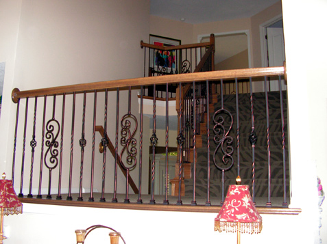 Scroll accents of Iron Spindles on Staircase