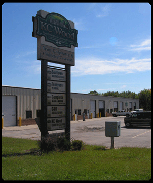 KC Wood for Trim Carpentry, Cabinets, Iron Spindles, Casework, & Countertops