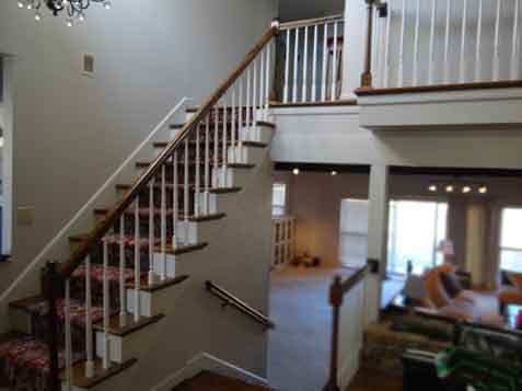 Plain round wood spindles replace with iron balusters kansas city