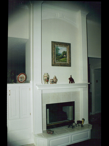 Tall Mantle with Arched Headpiece with Raised Panel Hearth and Fluted Columns